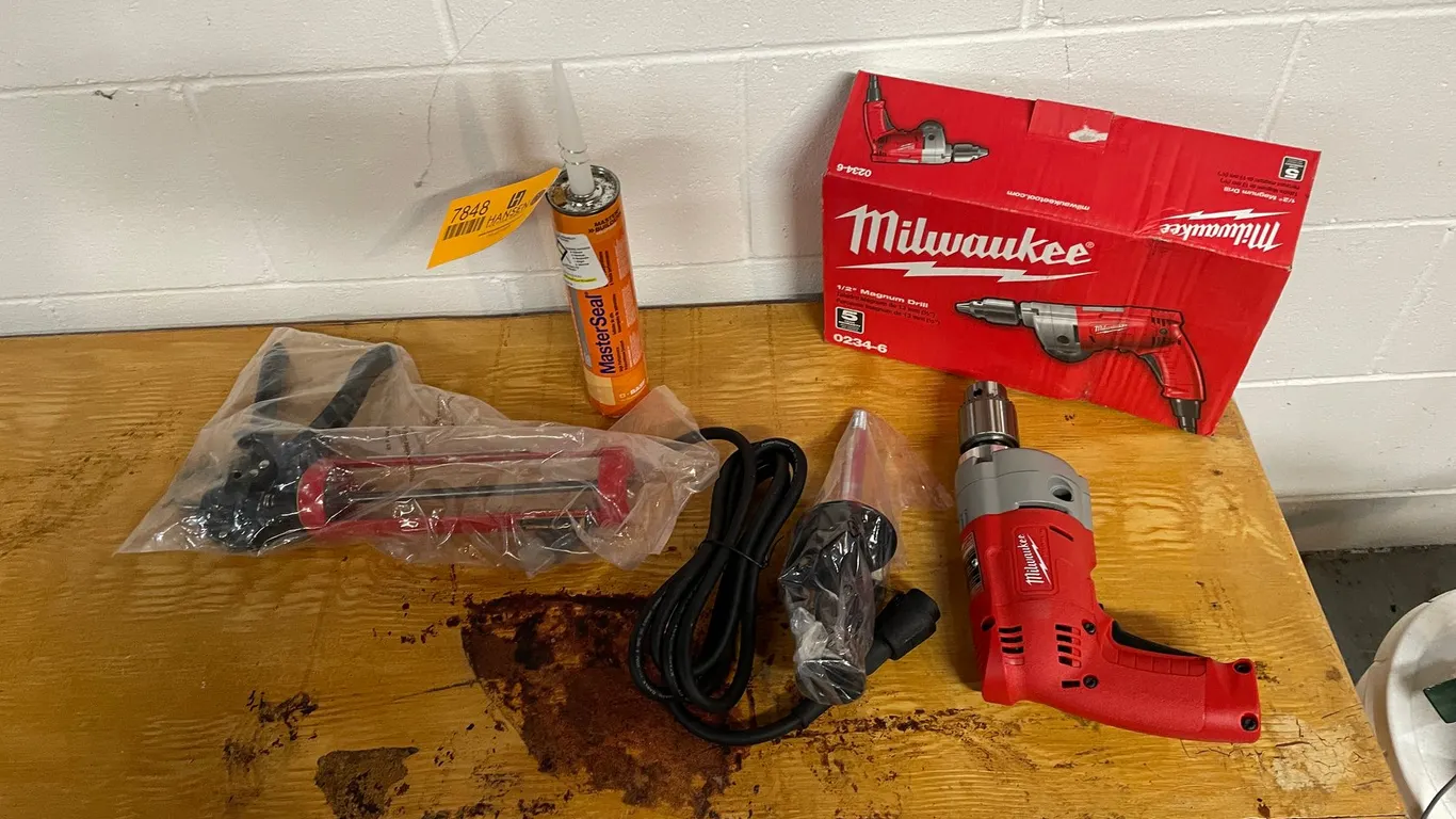 Milwaukee 1/2" Magnum Drill and Caulk Gun
