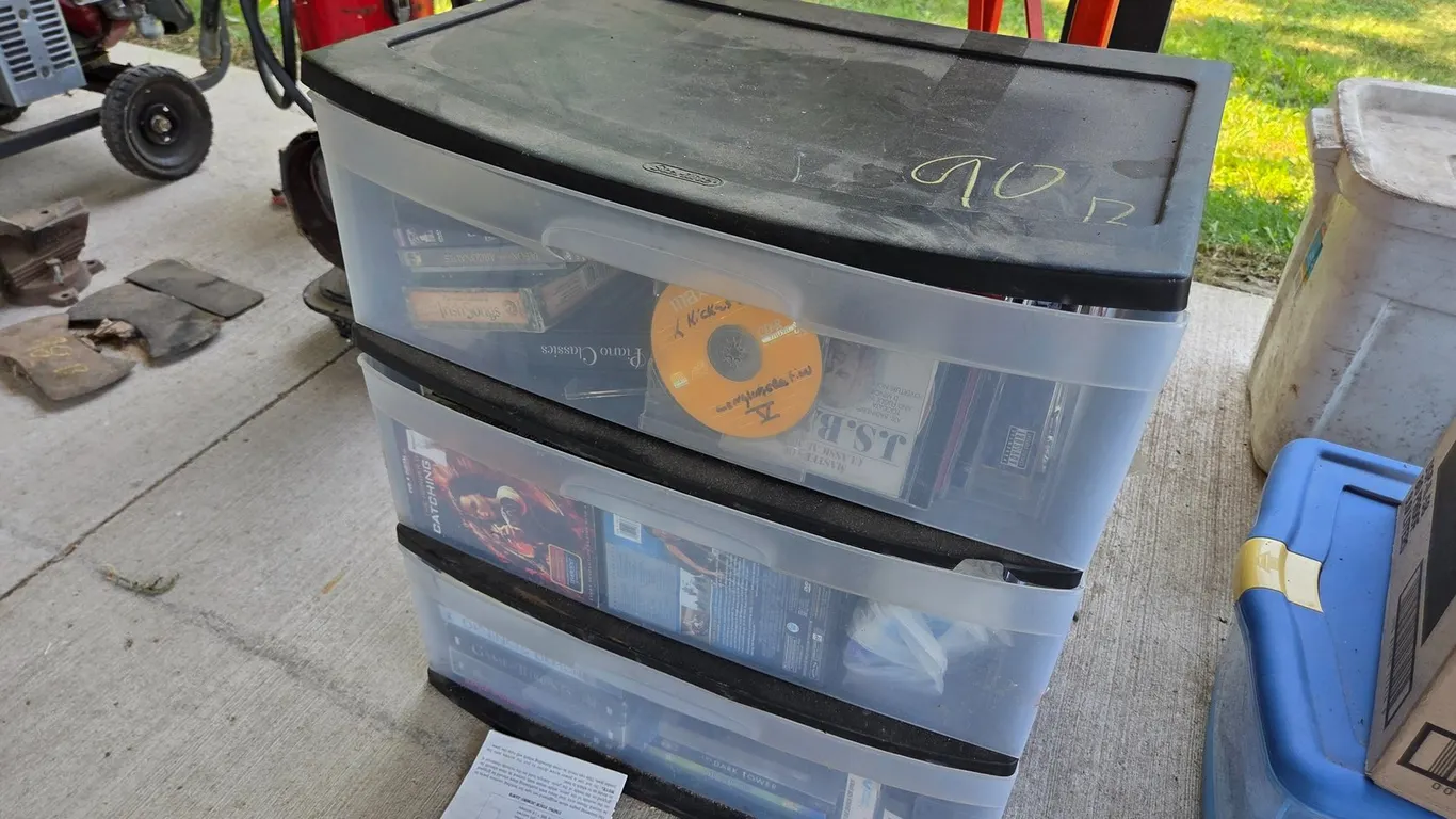 3 DRAWER STORAGE WITH ASSORTMENT OF DVDS