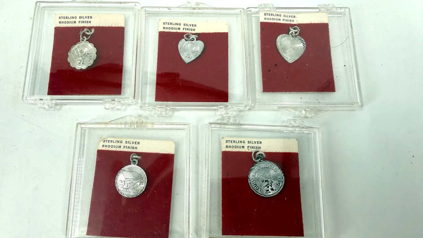 1984 LOUISIANA WORLD FAIR SILVERPLATE FINISH CHARMS (5)