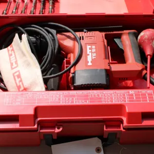 Hilti TE 18-M Corded Rotary Hammer Drill Stored in Red Hilti Storage Case