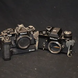 Lot of 2 Vintage Nikon Bodies, One FE2 Film Camera with Winder, Other Nikon