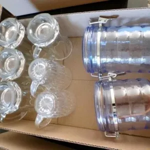 6-clear glass mugs and 2-plastic canisters