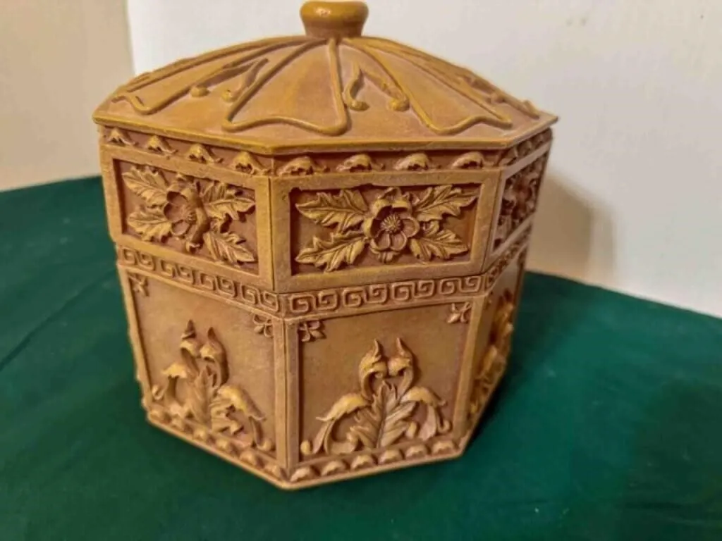 box of table decorations and glass picture frame
