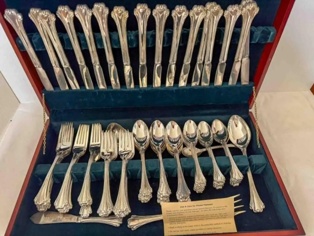 set of plated flatware in nice wood box