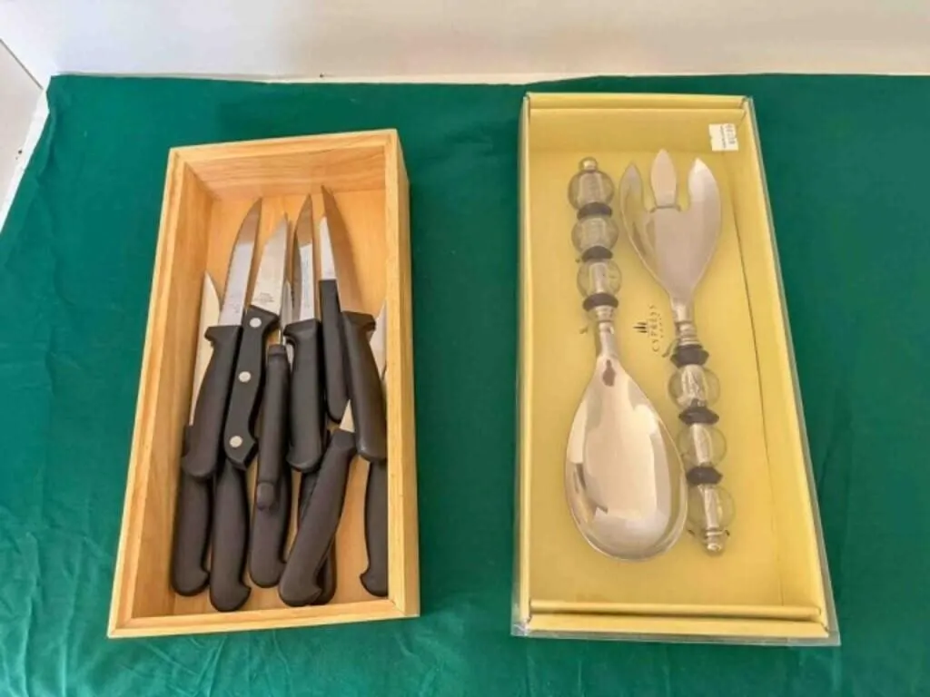 box of knives, pizza cutter, plates/bowls, etc