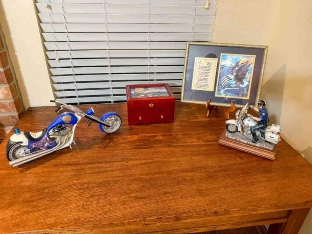 Box of police items, jewelry box, etc.