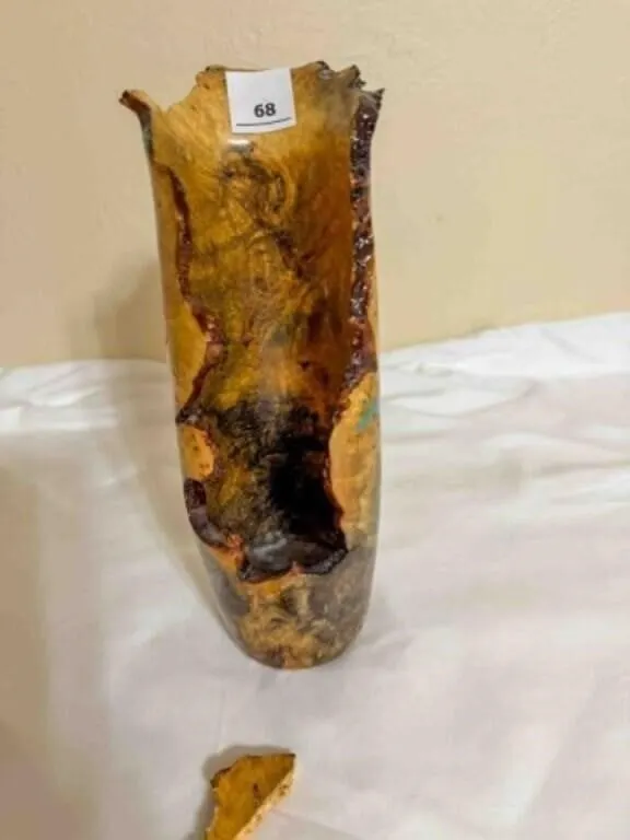Hand turned wood decoration, has small piece broke