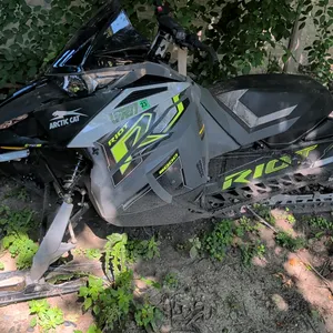 2021 Arctic Cat Riot 8000 ES IFP 1.6 snowmobile. Features a 794cc C-TEC2 engine, electric start, 146" track with 1.6" lugs, and IFP shocks. Styled in 
