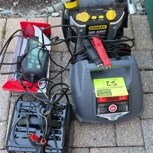 Battery charger and jump pack lot. Includes a Stanley 300 Amp jump-start system, a Schumacher HD 30/6/2 Amp battery charger with 100 Amp engine start,
