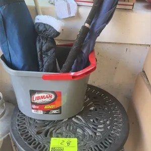 Patio side table and utility lot. Includes a 20" metal patio side table with a filigree design, a folding camp chair in a carrying bag, a Balloon Time