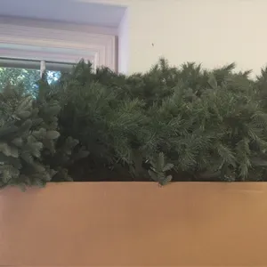 Assorted Christmas holiday decor. Includes a boxed 12'H pre-lit artificial Christmas tree with 4,430 radiant micro LED lights, artificial pine greener