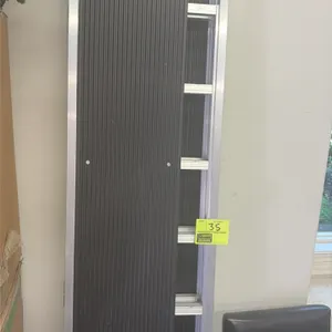 Aluminum trifold ramp. Features lightweight aluminum construction, a ribbed black traction surface, and protective red end caps. Dimensions: 91" x 18"