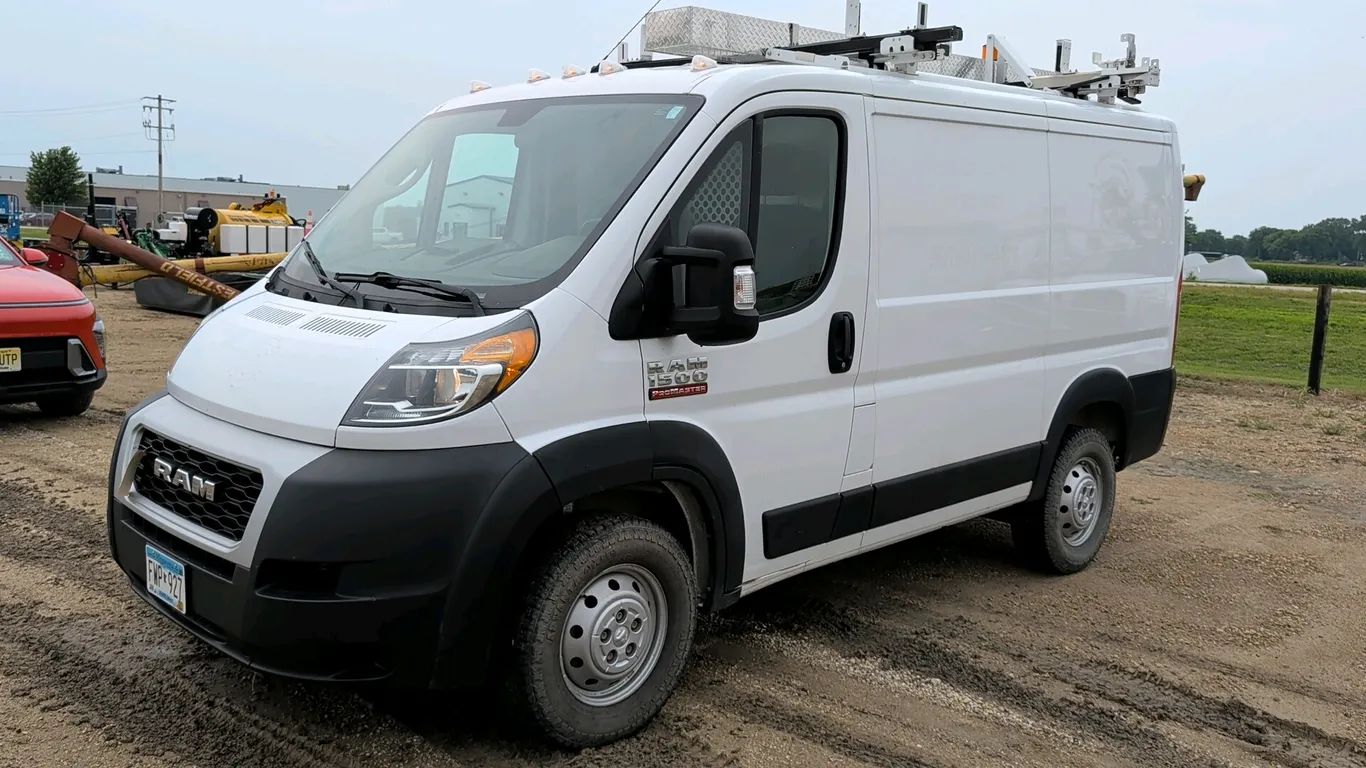 2021 RAM 1500 ProMaster cargo work van. Features interior Ranger Design multi-tier shelving, a walk-through partition gate, and rear double-swing carg