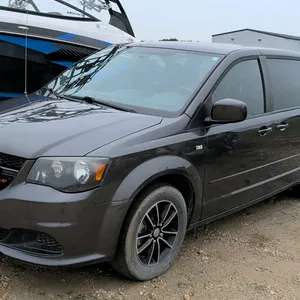 2014 Dodge Grand Caravan 30th Anniversary Edition passenger minivan. Features a 3.6L VVT V6 engine, automatic transmission, Stow 'n Go rear seating, a