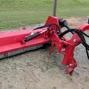 Titan 3-point mount flail mower. Features hydraulic offset and tilt adjustments, integrated PTO drive shaft, and front safety flaps. 7'L.