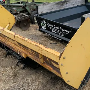 2018 Titan Attachments SP10 snow pusher. Features a curved steel moldboard, side support braces, side plates, and a rubber cutting edge. Equipped with
