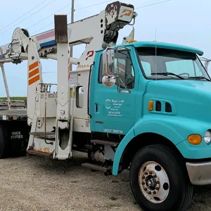 1999 Sterling flatbed crane truck. Features a Pioneer Series 1000 crane, 4 outriggers, 6-speed manual transmission, and wood deck flatbed. Showing 27,