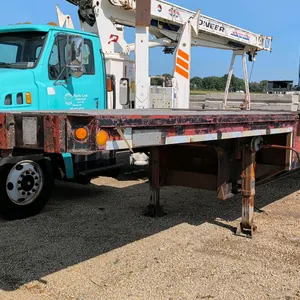 1981 Fontaine FDT-1-40 drop deck semi trailer. Features a 70,000 lb capacity frame rating, beaver tail with fold-down ramps, metal main deck, and wood