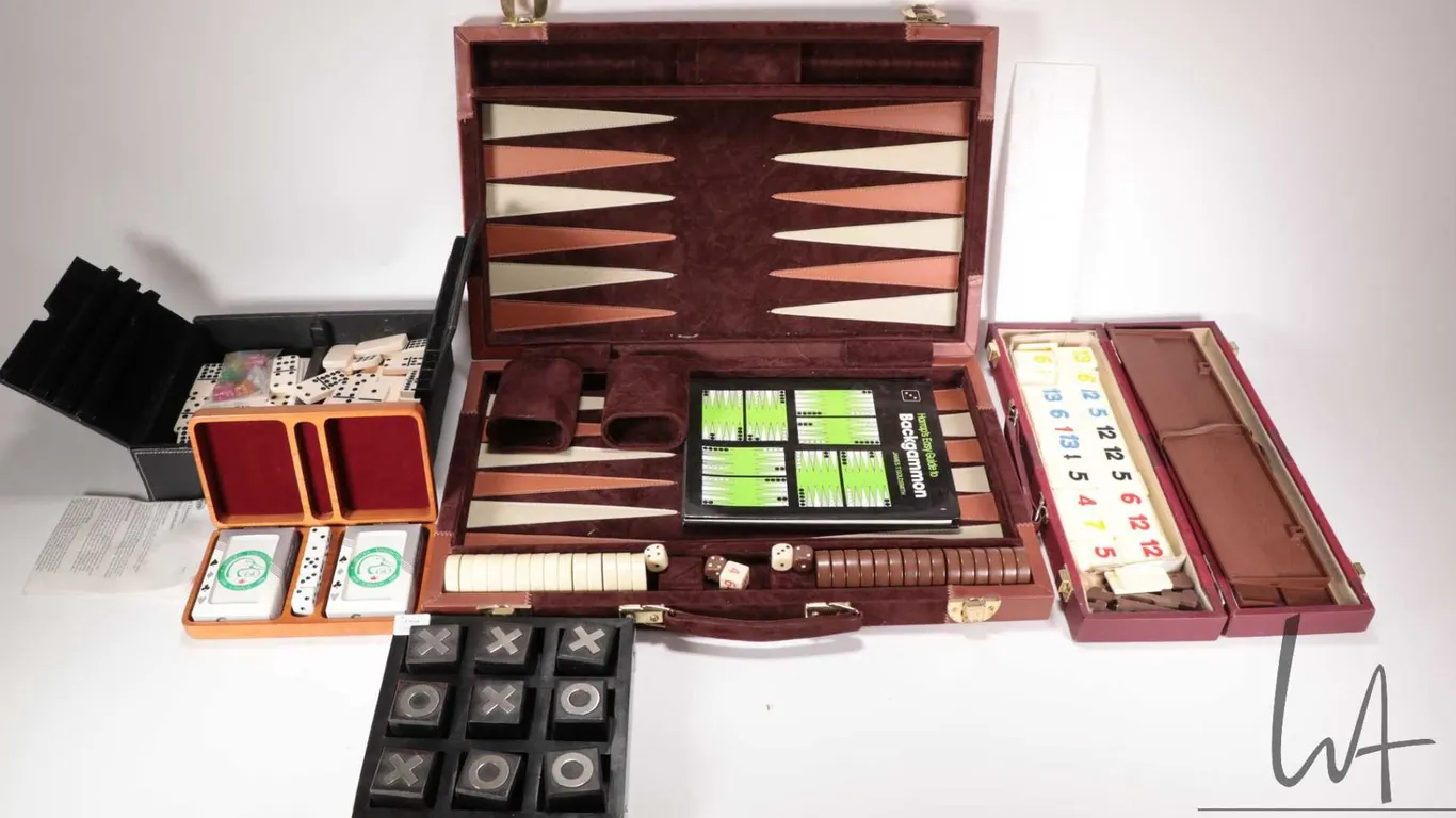 Five assorted board games including Tic-tac-toe, Dominos, Rummy, Backgammon and a Ducks Unlimited di
