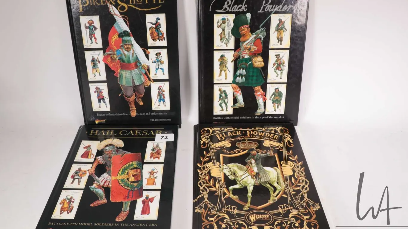Four hardcover WarLord Games books including "Battles of Model Soldiers in the Ancient Era", "Battle