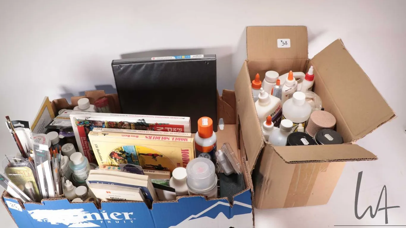Selection of hobby supplies including paints, brushes, solvents, mixing brushes, "Model Soldiers" il
