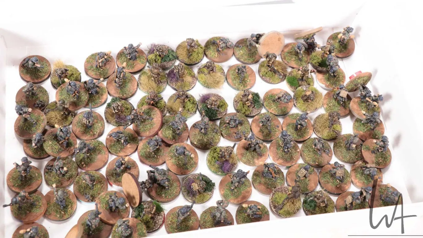 Selection of what appears to be 15mm WWII military figures, approximately 80 individually and intric