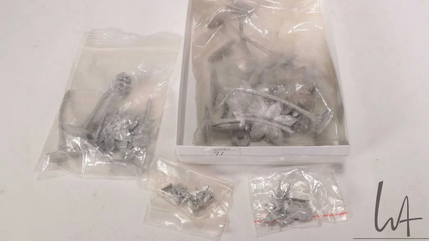 Cast metal palm trees and knights and horses