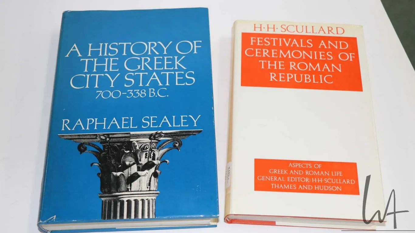 Two hardcover books including "A History of the Greek City States 700-338 B.C" by Raphael Sealey and