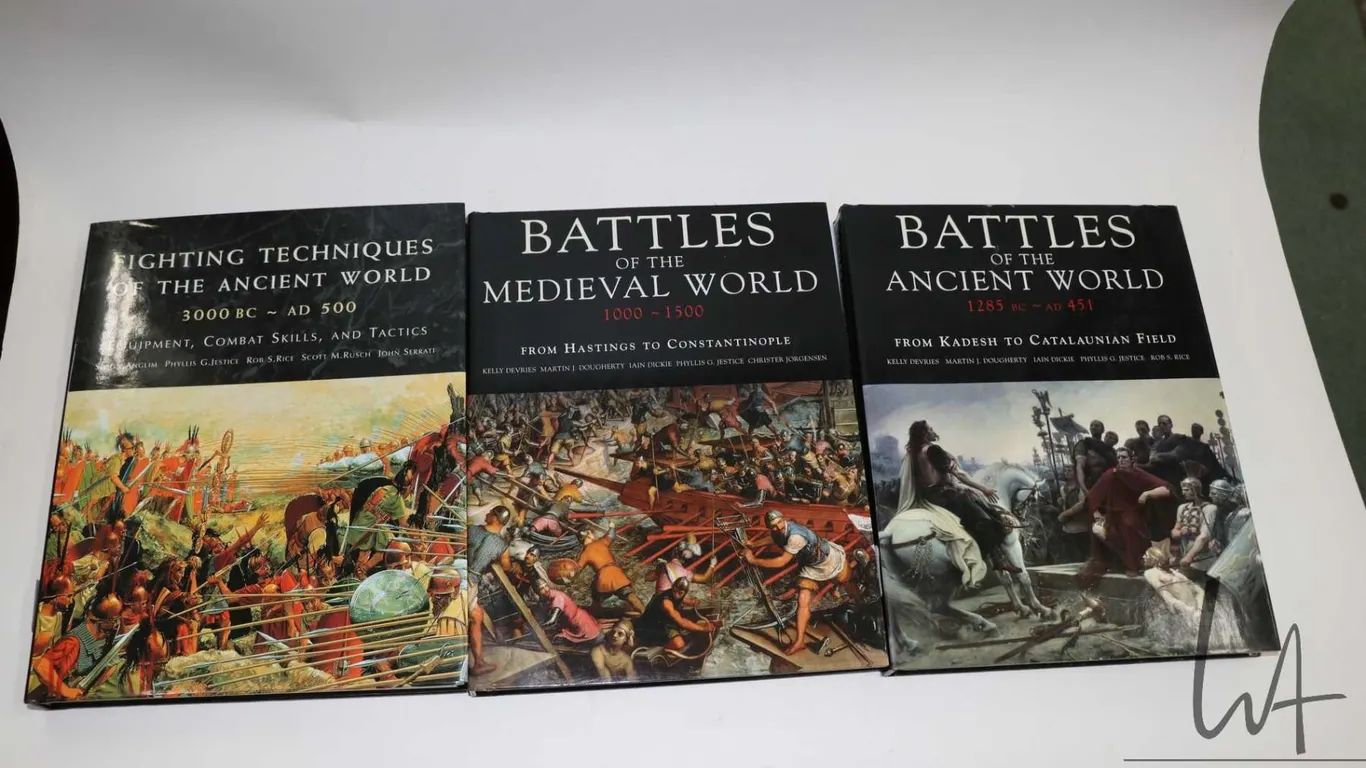 Three hardcover books including " Fighting Techniques of the Ancient World 3000 BC-AD 500: Equipment