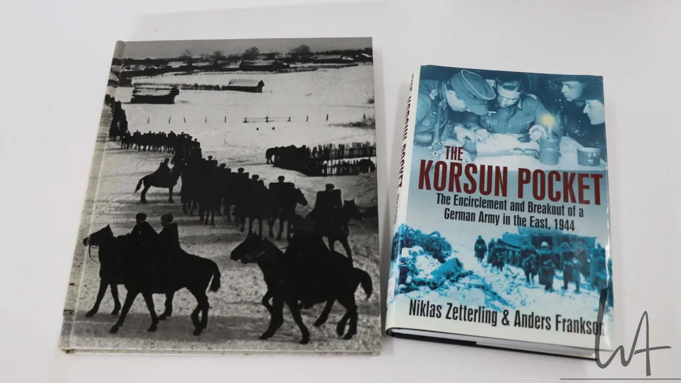 Two hardcover books including "The Korsun Pocket: The Encirclement and Breakout of a German Army in