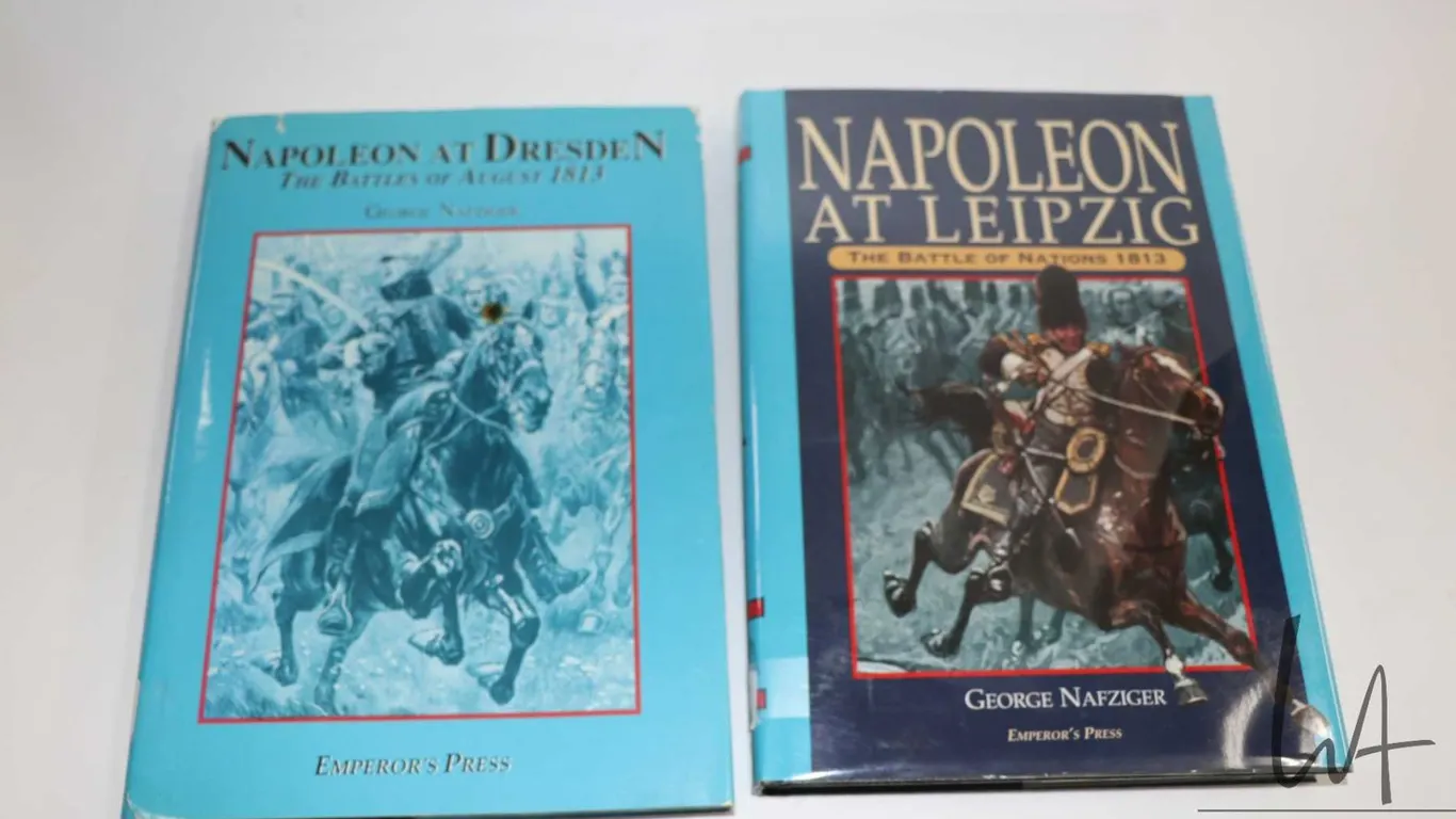 Two hardcover books, "Napoleon at Dresden: The Battle of August 1813" and "Napoleon at Leipzig: The