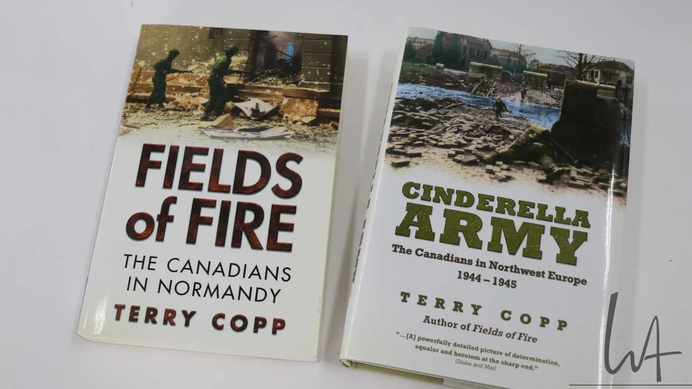 One hardcover and one softcover book including "Fields of Fire: The Canadians in Normandy" by Terry