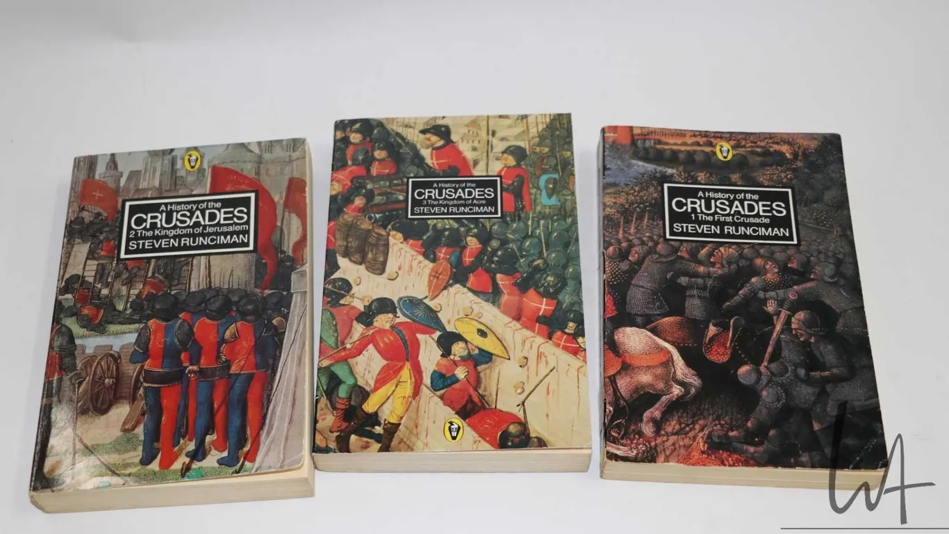 Three soft cover books including "A History of the Crusades 1 The First Crusade", " A History of the