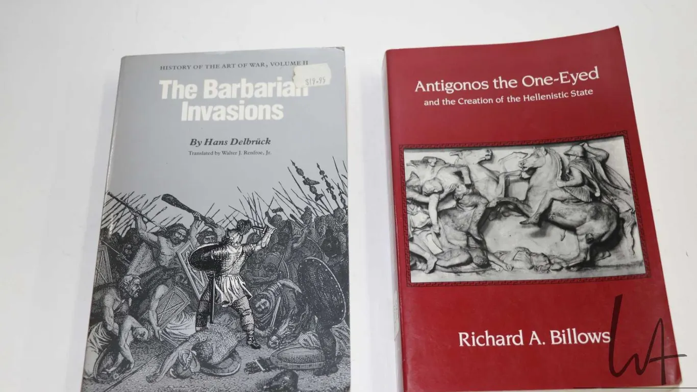 Two soft cover books including "The Barbarian Invasions" by Hans Delbruck and "Antigones the One-Eye