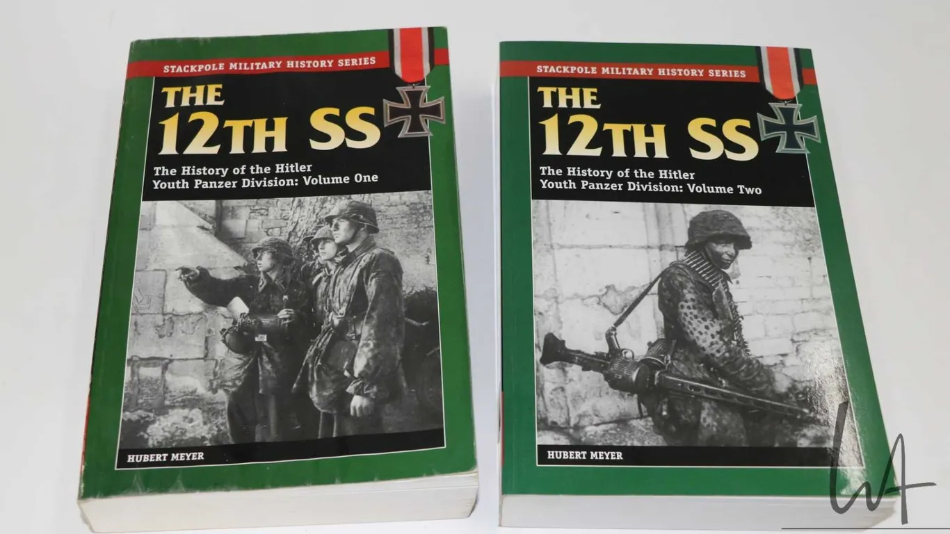 Two softcover books including "The 12th SS Volume One" and "The 12th SS Volume Two" by Hubert Meyer