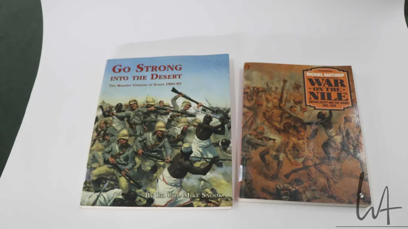 Two softcover books including "War on the Nile" by Michael Barthorp and "Go Strong Into the Desert"