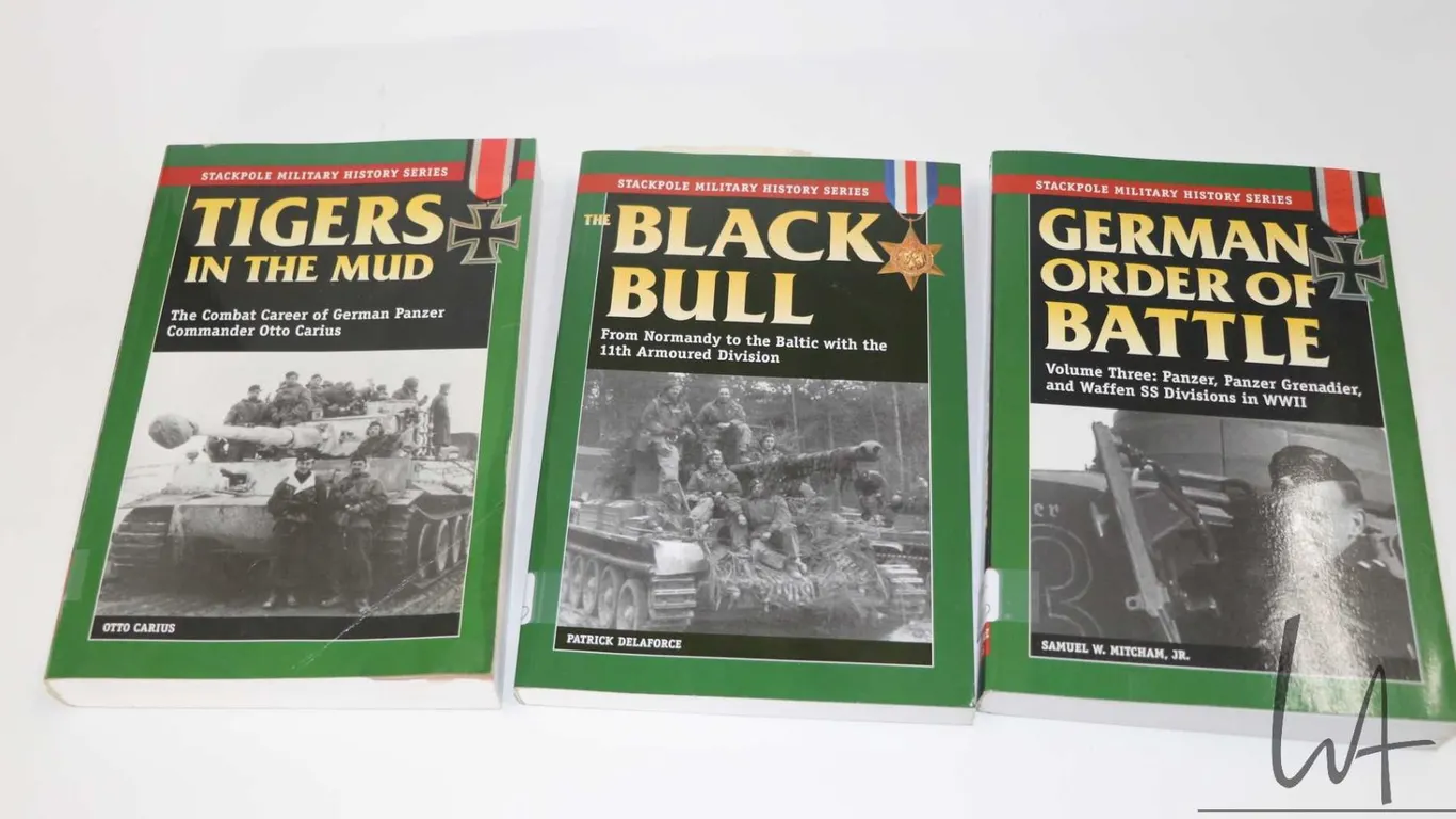 Three softcover books including "German Order of Battle" by Samuel W. Mitcham, Jr. , "The Black Bull