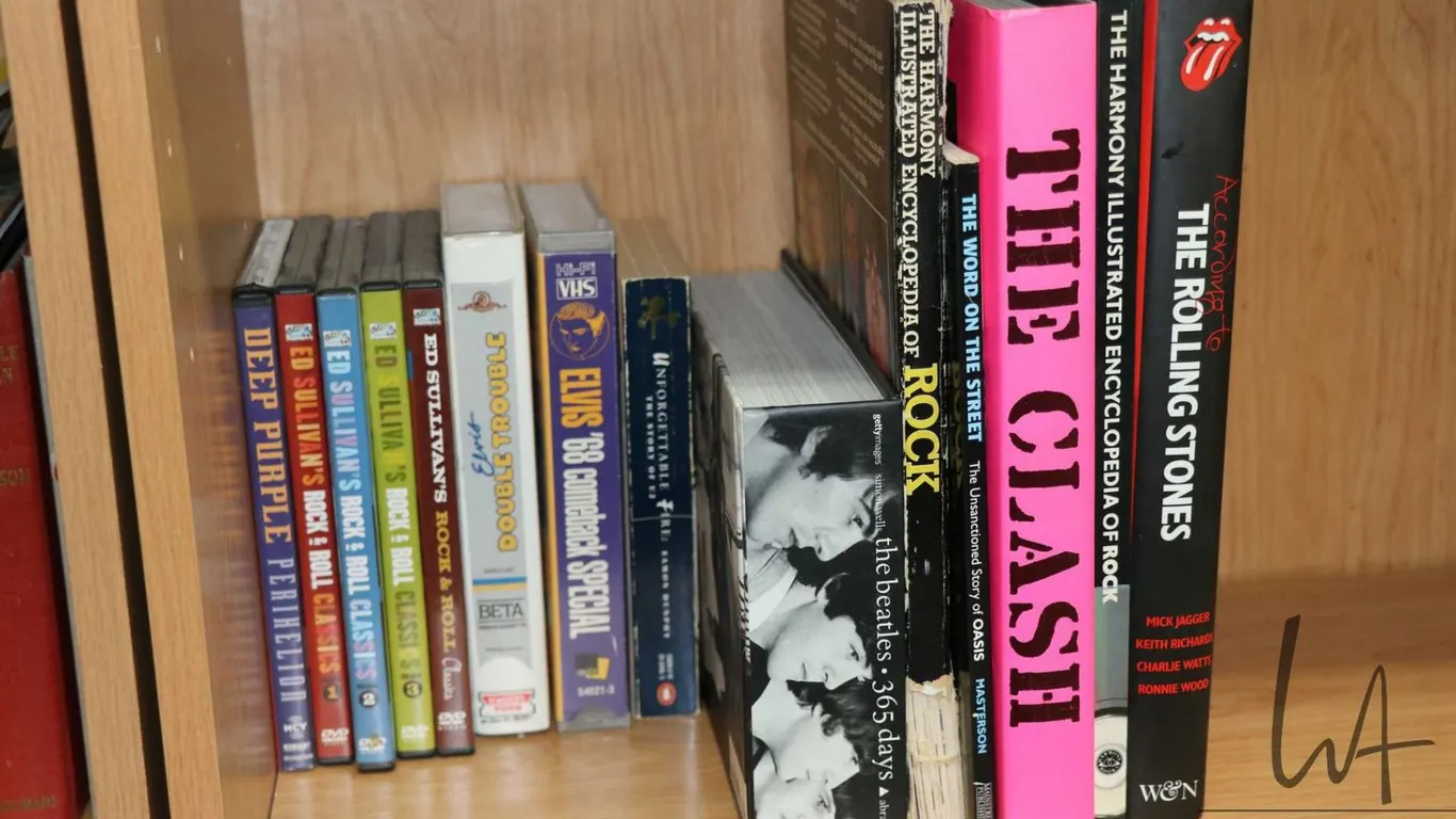 Selection of music related books, DVD and Elvis VHS tapes