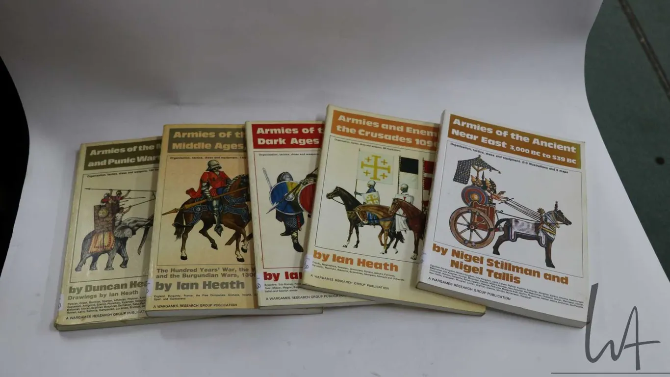 Five softcover books each illustrated an includes information on orginisation, tactics, dress and we