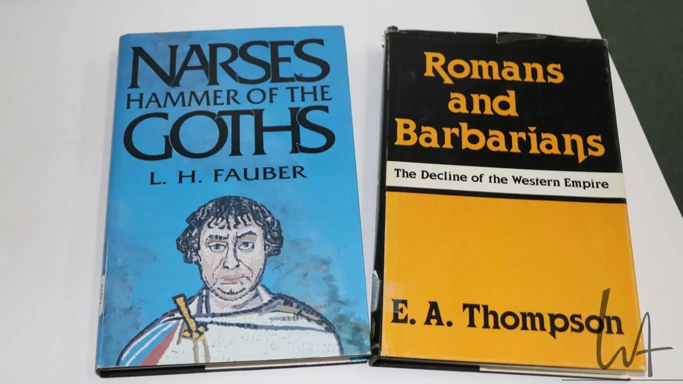 Two hardcover books including Romans and Barbarians: The Decline of the Western Empire" by E.A. Thom