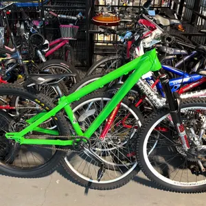 GREEN 1-SPEED BICYCLE WITH FRONT SHOCKS