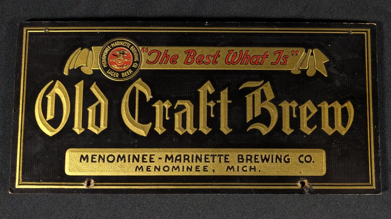 EARLY PRESSED BOARD SIGN "THE BEST WHAT IS" OLD CRAFT BREW LAGER BEER MENOMINEE MARINETTE BREWING CO MICHIGAN