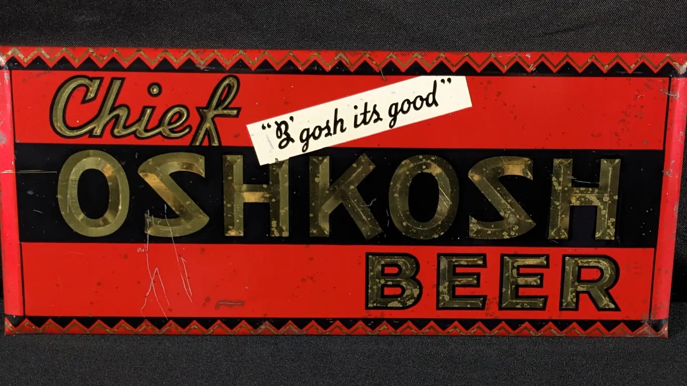 TOC TIN SIGN CHIEF OSHKOSH BEER "B'GOSH IT'S GOOD" WISCONSIN