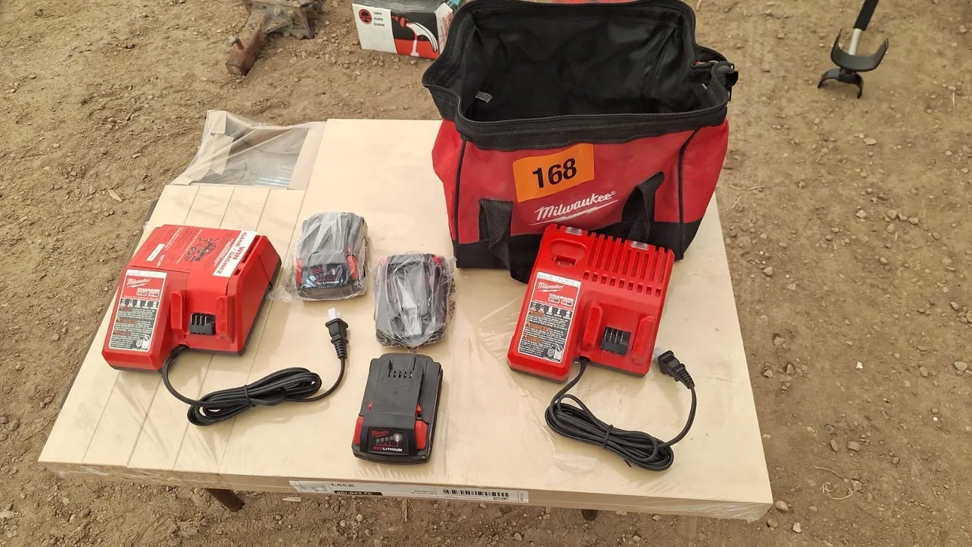 3 New Milwaukee battery 2 charger with bag