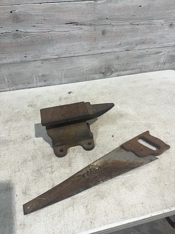Anvil and hand saw