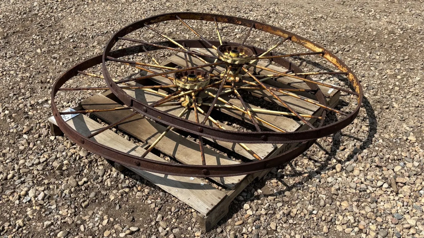 (2) Iron Wagon Wheels