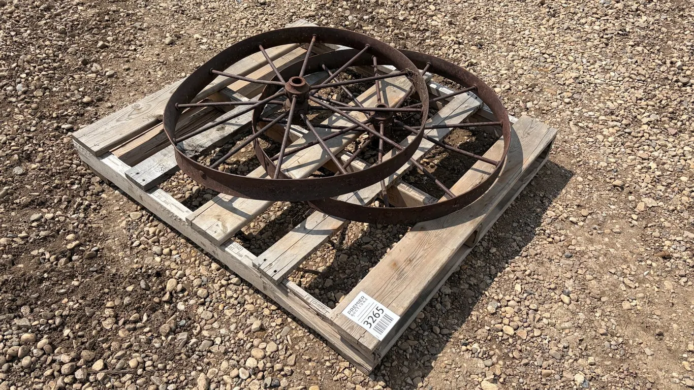 (2) Iron Wagon Wheels