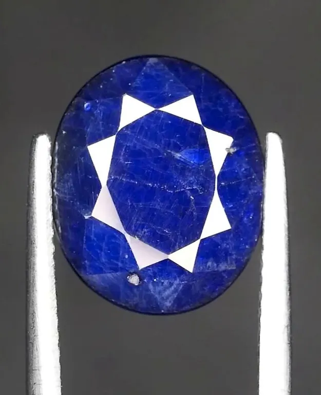 *^7.3 ct Certified Deep Blue Sapphire gemstone ($8,760 Appraisal)