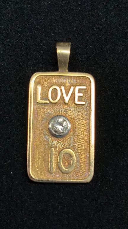APPROX 14K PENDANT SET WITH DIAMOND (.31CT, 11.6G)