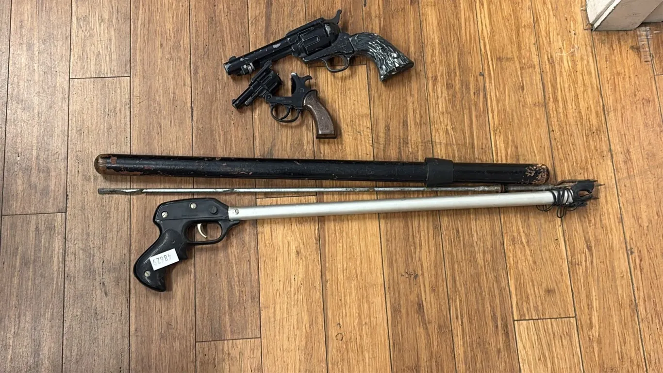 ASSORTED WEAPONS; BATON, SPEAR GUN, STARTER PISTOL, CROSMAN SINGLE ACTION 6 CO2 REVOLVER (REQUIRES